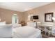 Bedroom featuring two beds, a television, and a view into the bathroom at 201 Ocean Blvd. S # 1505, North Myrtle Beach, SC 29582