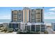 Striking exterior of a condo building featuring multi-story parking garage and ocean views at 201 Ocean Blvd. S # 1505, North Myrtle Beach, SC 29582