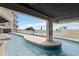 Outdoor pool area featuring lounge chairs and lush landscaping at 201 Ocean Blvd. S # 1505, North Myrtle Beach, SC 29582