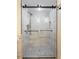 Sleek new glass enclosed shower with modern fixtures and elegant tile work at 201 Ocean Blvd. S # 1505, North Myrtle Beach, SC 29582