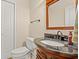 Bathroom featuring dark vanity and a framed mirror with matching fixtures at 2019 Ye Olde Kings Hwy., North Myrtle Beach, SC 29582