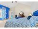 Bedroom featuring an interesting blue, geometric print, carpet, and view of a bright window at 2019 Ye Olde Kings Hwy., North Myrtle Beach, SC 29582
