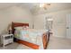 Bedroom with a queen bed, ceiling fan and ensuite bathroom, providing comfort and privacy at 2019 Ye Olde Kings Hwy., North Myrtle Beach, SC 29582