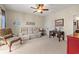 Cozy living room with neutral walls and furnishings including a beige recliner and decorative artwork at 2019 Ye Olde Kings Hwy., North Myrtle Beach, SC 29582