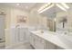 Bright bathroom with a walk-in bathtub, vanity, mirror, and good lighting for added convenience at 202 Glenwood Dr., Conway, SC 29526
