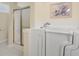 Bathroom with a walk-in bathtub with a faucet, and a shower with sliding glass doors for a modern touch at 202 Glenwood Dr., Conway, SC 29526