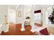 Open-concept dining room with hardwood floors, chandelier, and adjacent living spaces at 202 Glenwood Dr., Conway, SC 29526