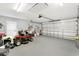 Spacious garage featuring epoxy floor, ample storage, and convenient access at 202 Glenwood Dr., Conway, SC 29526