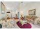 Bright living room showcasing a vaulted ceiling, comfortable seating and ample natural light at 202 Glenwood Dr., Conway, SC 29526