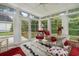 Sunny porch with large windows providing views of the surrounding landscape at 202 Glenwood Dr., Conway, SC 29526