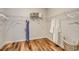 Spacious walk-in closet with ample storage, wire shelving, and hardwood floors at 202 Meadow Sweet Pl, Conway, SC 29526