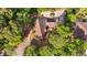 Overhead view of the house showing architectural roof design, greenery and winding driveways at 206 Dogwood Dr., Myrtle Beach, SC 29575