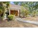Inviting front entrance with a pathway leading to a covered porch and wood front door at 206 Dogwood Dr., Myrtle Beach, SC 29575