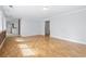 Well-lit living room showcasing wood flooring and plenty of open space at 206 Dogwood Dr., Myrtle Beach, SC 29575