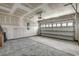 Spacious two car garage with concrete floor and bright overhead lighting at 264 Bolsin Ct, Conway, SC 29526