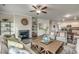 Open-concept living room with fireplace transitions to the kitchen and dining area; great for entertaining at 264 Bolsin Ct, Conway, SC 29526