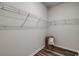 Spacious walk-in closet with wire shelving and a woven basket for storage at 264 Bolsin Ct, Conway, SC 29526