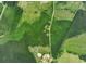 Aerial view showcases abundant woodlands, creating a private setting at 2776 Holly Rd., Marion, SC 29571