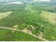 The property is surrounded by dense woodlands, promising privacy and a natural setting at 2776 Holly Rd., Marion, SC 29571