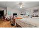 Spacious bedroom featuring wood floors, a ceiling fan and natural lighting at 2776 Holly Rd., Marion, SC 29571