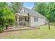 Charming house exterior showcasing its cozy design with a covered front porch at 2776 Holly Rd., Marion, SC 29571