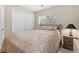 Bedroom featuring a comfortable bed, nightstand and a double door closet at 3 Birdsong Ct., Murrells Inlet, SC 29576