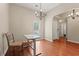 Well-lit dining room with versatile table, ideal for dining or a functional workspace at 3 Birdsong Ct., Murrells Inlet, SC 29576