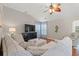 Cozy living room features a comfortable sofa, modern TV, and a relaxing ambiance at 3 Birdsong Ct., Murrells Inlet, SC 29576