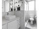 Stylish bathroom featuring modern fixtures, marble-look tile, and a glass-enclosed shower at 306 Salt Marsh Circle # 5A, Pawleys Island, SC 29585