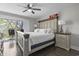 Spacious bedroom with a large window view of the outdoors and a comfortable king-sized bed at 306 Salt Marsh Circle # 5A, Pawleys Island, SC 29585