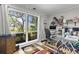 Bright home office featuring a large window with a beautiful view and a modern glass desk at 306 Salt Marsh Circle # 5A, Pawleys Island, SC 29585
