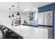 Bright kitchen with stainless steel appliances, large island, and a modern design at 306 Salt Marsh Circle # 5A, Pawleys Island, SC 29585