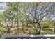 Breathtaking views of marsh and abundant trees from balcony at 306 Salt Marsh Circle # 5A, Pawleys Island, SC 29585