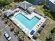 Aerial view of community pool area with ample seating and well-maintained landscaping at 306 Salt Marsh Circle # 5A, Pawleys Island, SC 29585