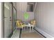 Cozy screened-in porch with comfortable seating, offering a relaxing outdoor retreat at 306 Salt Marsh Circle # 5A, Pawleys Island, SC 29585