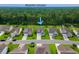 Beautiful neighborhood featuring green landscaping and convenient access to a forest at 306 Southgate Ct., Pawleys Island, SC 29585