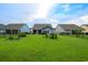Spacious backyard with lush green grass, fenced for privacy and pet safety at 306 Southgate Ct., Pawleys Island, SC 29585