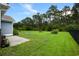 Spacious backyard featuring a lush lawn and a fence-lined perimeter for added privacy at 306 Southgate Ct., Pawleys Island, SC 29585