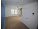 Living room with neutral carpet, and ample natural light at 306 Southgate Ct., Pawleys Island, SC 29585