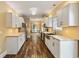 Bright kitchen with stainless steel appliances, ample storage, and hardwood floors at 3565 Steamer Trace Rd., Conway, SC 29527