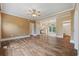 Open concept living room featuring hardwood floors, neutral paint colors, and recessed lighting at 3565 Steamer Trace Rd., Conway, SC 29527