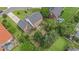 Aerial view of a home with a large backyard, patio, and mature trees in a well-kept neighborhood at 3605 Kingsley Dr., Myrtle Beach, SC 29588