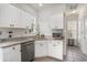 Bright kitchen features stainless steel appliances, white cabinets, and granite countertops at 3605 Kingsley Dr., Myrtle Beach, SC 29588