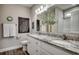 Elegant bathroom with a double sink vanity, granite countertops, and modern fixtures at 364 Copperwood Loop, Conway, SC 29526