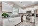 Well-equipped kitchen with stainless steel appliances, granite countertops, and ample white cabinetry at 364 Copperwood Loop, Conway, SC 29526