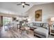 Open-concept living space with modern finishes, vaulted ceiling, and seamless flow to the dining area and kitchen at 364 Copperwood Loop, Conway, SC 29526