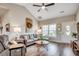 Spacious living room boasts a vaulted ceiling, stylish decor, and ample natural light at 364 Copperwood Loop, Conway, SC 29526
