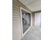 View of the patio with sliding glass doors and outdoor storage closet at 3786 Hitchcock Way # 321, Myrtle Beach, SC 29577