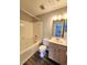Clean bathroom with tub and shower combo, with light wood vanity and vinyl flooring at 3786 Hitchcock Way # 321, Myrtle Beach, SC 29577