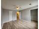 Open bedroom with a ceiling fan, closet and a neutral color scheme, with luxury vinyl plank flooring throughout at 3786 Hitchcock Way # 321, Myrtle Beach, SC 29577